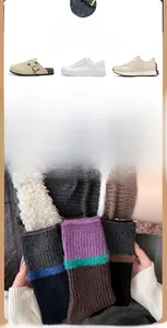 Detailed view of thick knit wool socks in retro color blocks and soft ribbed texture