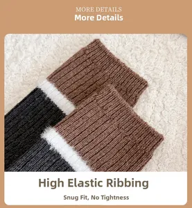Close-up of elastic ribbed cuffs on wool socks showing warm color-block stitching details