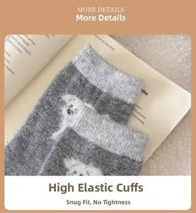 Close-up of thick knitted wool socks with cartoon dog pattern and elastic ribbed cuffs