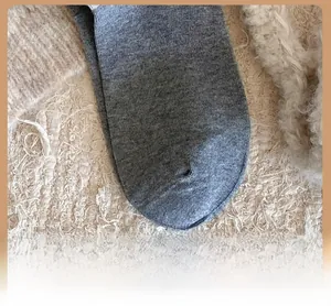 Close-up of reinforced toe detail on grey cotton knit socks for extra durability