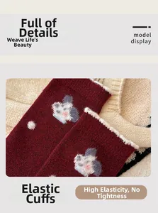 Close-up of elastic plush cuffs and cute animal pattern on thick wool winter socks