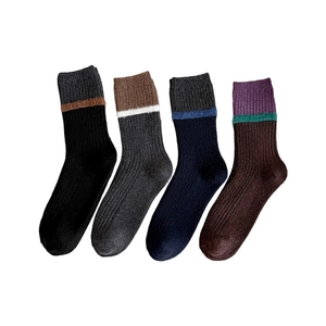 Set of 4 wool blend crew socks for women in striped winter colors with ribbed texture