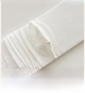 Detailed close-up of reinforced heel texture on white silk knit socks for durability