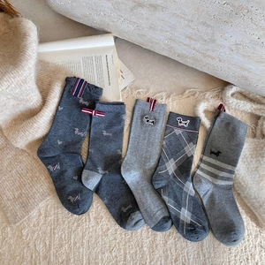 Five pairs of grey mid-calf socks with cute dachshund embroidery and striped ribbing