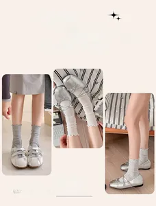 Detail of grey heather socks with ruffle trim and high-quality double needle weaving