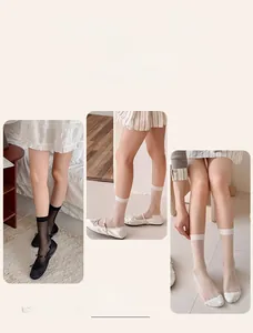 Detail of sheer mesh crew socks in black and beige with breathable striped texture