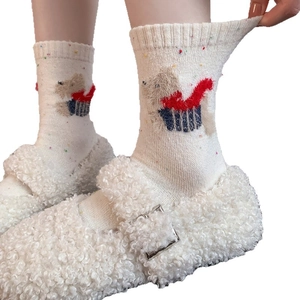 Thick wool socks with cartoon dog pattern and colorful polka dots in warm knit style