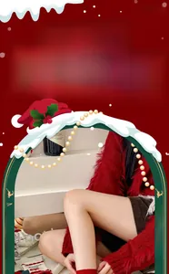 Close-up of festive Christmas outfit with red plush cardigan and warm holiday socks