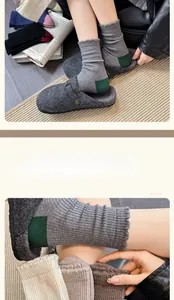 Detailed knit texture of wool socks featuring wavy ruffled cuffs and ribbed cotton material