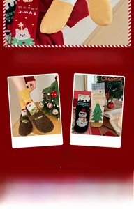 Detail of Christmas themed cotton socks featuring festive patterns and ribbed cuffs