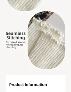 Détail de jambières en tricot blanc côtelé avec pointe sans couture et bord festonné