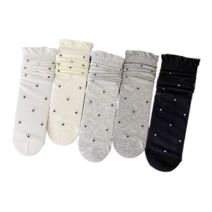 Five-pack women's mesh crew socks with polka dots and ruffle cuffs in assorted colors