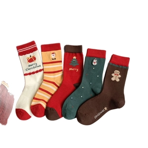 Set of 5 Christmas themed combed cotton mid-calf socks with festive holiday patterns