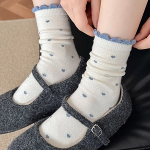Women's thick wool crew socks with blue heart pattern and ruffled cuffs for winter