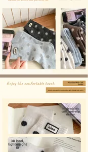 Close-up of polka dot thermal socks with high-elastic cuffs and nice fabric label