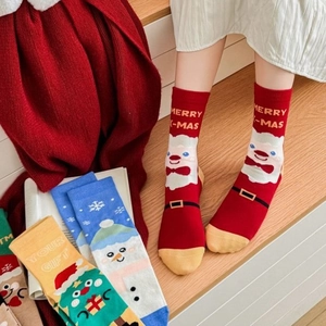 Cozy Christmas themed crew socks set with Santa and Snowman prints for women