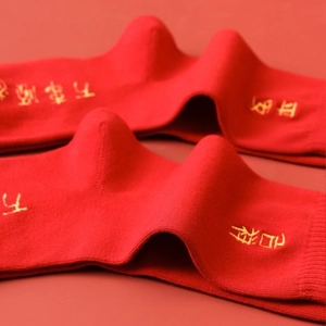 Festive red cotton crew socks with gold zodiac embroidery and ribbed cuffs for New Year
