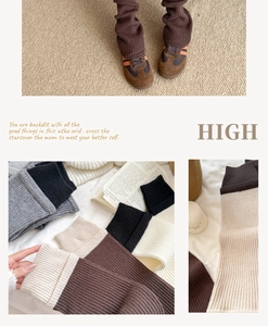 Detailed close-up of ribbed knit texture on stylish flared patchwork leg warmers