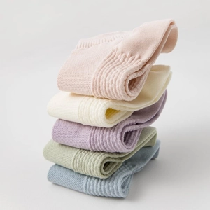 Five pairs of pastel cotton ankle socks with waffle knit texture and ribbed cuffs