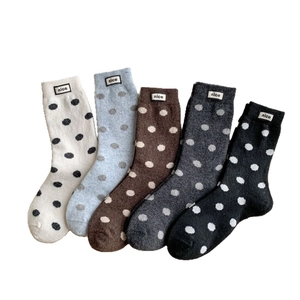Five pack of warm polka dot crew socks in cream, blue, brown, grey and black colors