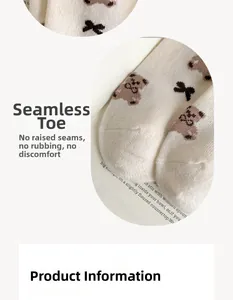 Macro detail of seamless toe construction on warm cashmere socks with cute bear pattern
