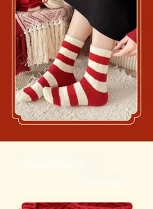 Detail of red and white striped festive socks featuring warm knitted wool texture