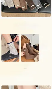 Collage of thick wool socks in earth tones with stylish label detail and warm texture