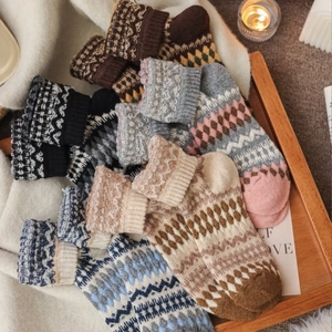 Cozy Nordic Fair Isle knit wool socks with vintage diamond patterns in warm tones