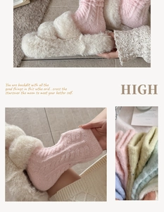 Close-up of pastel cable knit thermal socks showing soft plush texture and thick fabric