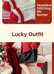 Macro view of seamless toe stitching and warm red festive socks worn in winter setting