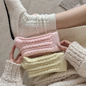 Thick warm mid-calf socks with cable knit texture in pink white and yellow colors