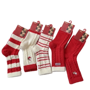 Set of 5 festive red and white thermal knit socks for Christmas and New Year with card tag