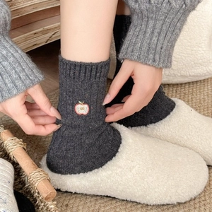 Thick wool socks for women with red apple embroidery and dark grey ribbed knit texture