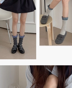 Detail of cable knit crew socks with blue gingham ruffle trim and Mary Jane shoes
