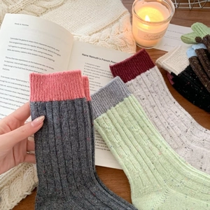 Thick wool blend mid-calf socks with multi-color splicing and cozy speckled knit texture