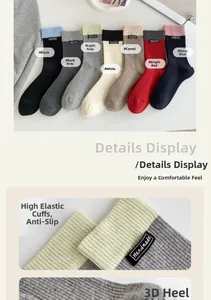 Detail of ribbed cotton mid-calf socks with handmade labels in various stylish colors