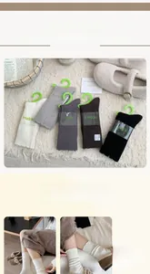 Detailed knit texture of wool-blend socks in neutral tones with minimalist packaging