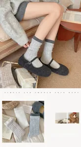 Detail of warm wool blend ribbed socks for women showing thick texture and earthy colors
