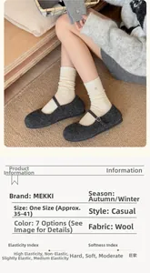Close-up of wool texture and sizing details for mid-calf thermal socks with silver buckle