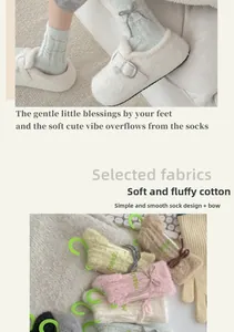 Close-up of plush knit socks with ribbon bow detail in various pastel colors