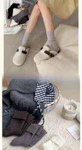 Detailed knit texture of vintage wool-blend crew socks with wavy scalloped cuffs