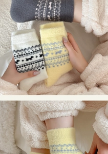 Detail of soft Fair Isle plush socks showing fluffy texture and Nordic winter patterns