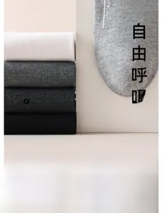Breathable cotton socks for men in black, white and grey showing eco-friendly natural materials