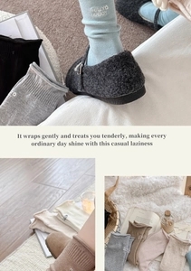 Detailansicht der Pastell-Kaschmir-Socken mit 'FULLY ENJOY' Stickerei und Stricktextur