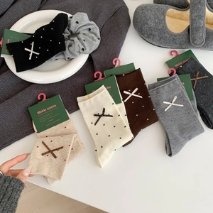Cozy wool crew socks set with polka dots and bows in assorted autumn neutral colors