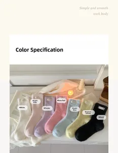 Detailed view of colorful mink fleece socks with handmade labels in seven vibrant colors