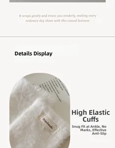 Detail of white faux mink fur sock cuff featuring a stitched Handmade label and elastic band