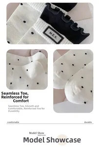 Detail of polka dot crew socks featuring ruffle cuffs and reinforced seamless toe design