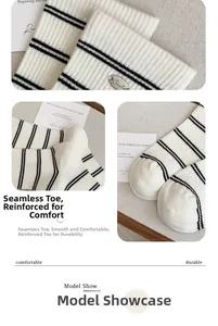 Detail of striped socks showing seamless toe and silver Smile decorative button