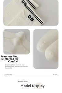 Close-up of seamless toe and reinforced tip on white ribbed college style sports socks
